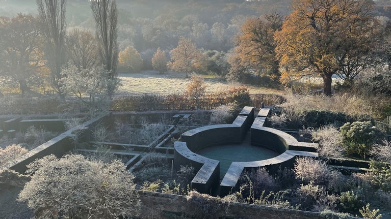 A frosty view of Sissinghurst's Rose Garden roundel from the top of the Tower